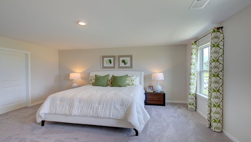 Furnished interior in a model home at Tap Root Farms in Fletcher (Image 18).