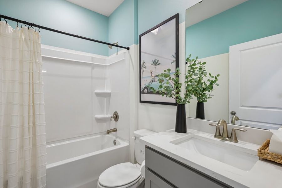 Furnished interior in a model home at Mahogany At Jubilee in Pace (Image 33).