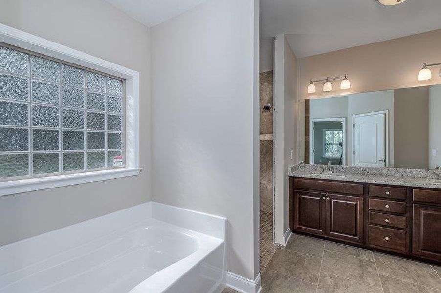 Furnished interior in a model home at Castlebrook in Locust Grove (Image 3).