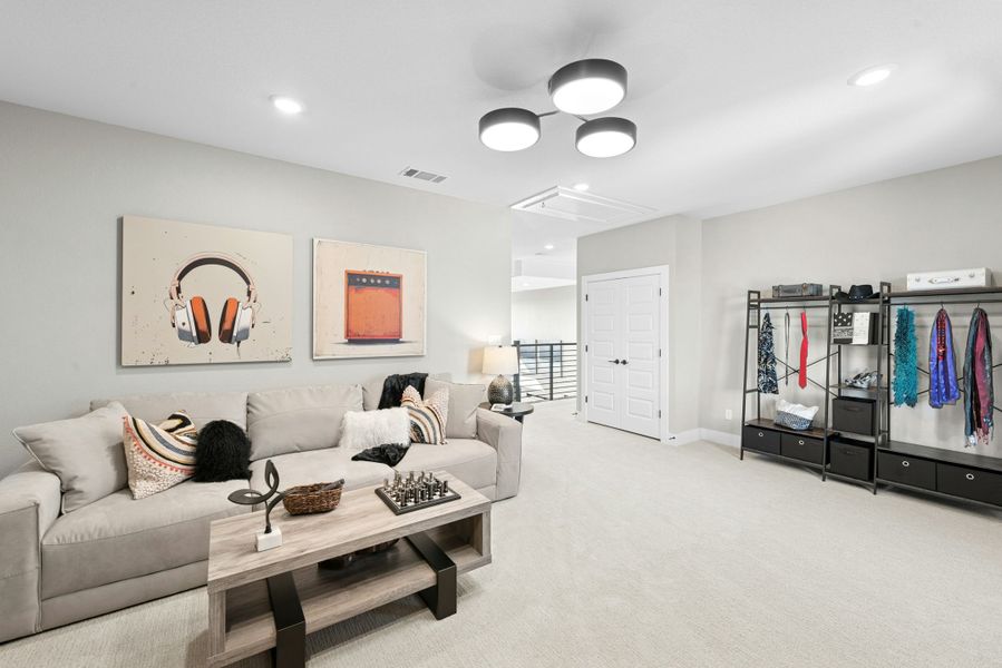 Furnished interior in a model home at Caliterra in Dripping Springs (Image 56).