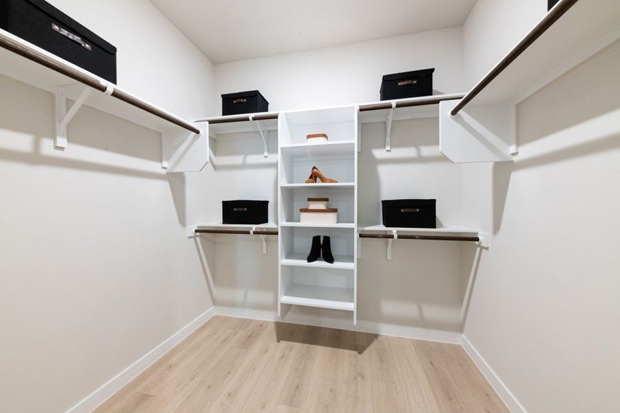 Furnished interior in a model home at The Woodlands in Mico (Image 26).