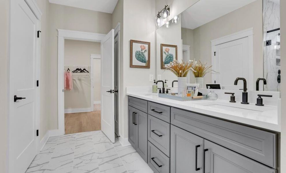 Furnished interior in a model home at Enclave at Riverdale in Huntersville (Image 29).