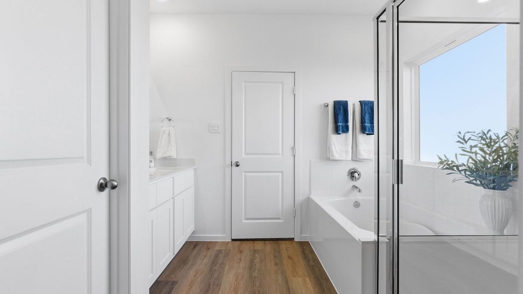 Furnished interior in a model home at Caldwell Crossing in Iowa Colony (Image 19).