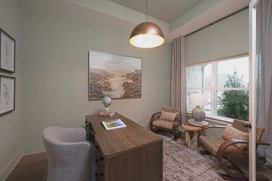 Furnished interior in a model home at Sunday Creek at Kinder Ranch in San Antonio (Image 6).