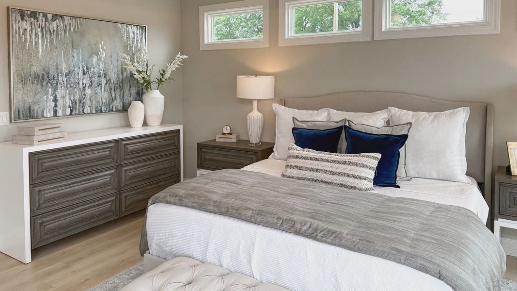 Furnished interior in a model home at The Courtyards at Hodges Farm in Charlotte (Image 35).