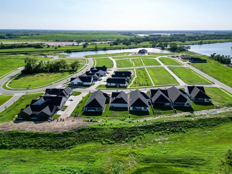 Aerial view of the The Courtyards at The Moorings community in Wichita, KS, showing layout and nearby surroundings (Image 7).