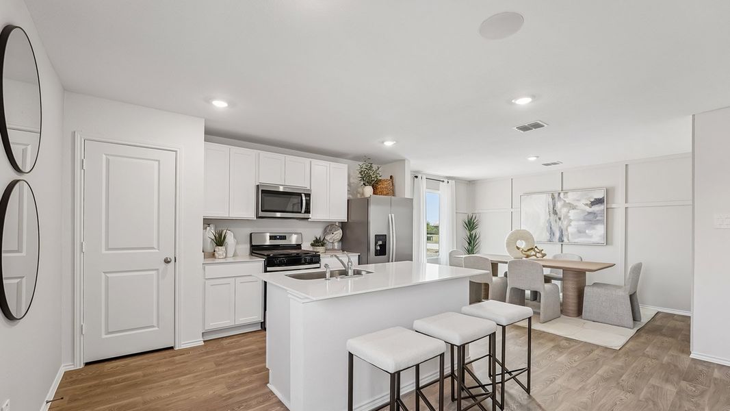 Furnished interior in a model home at Marigold in Kyle (Image 10).
