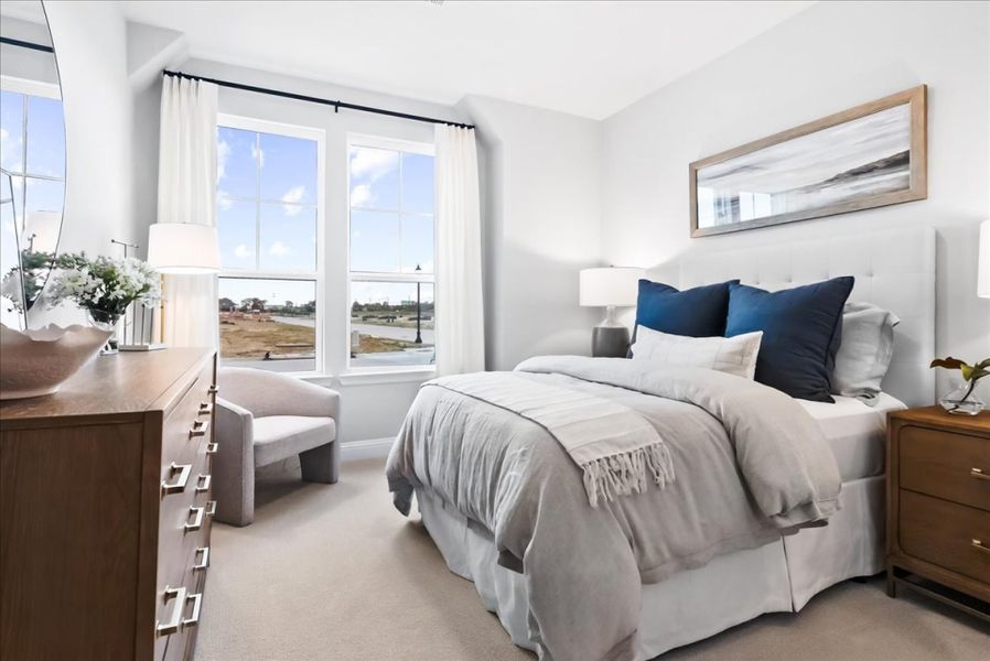 Furnished interior in a model home at The Reserve at Spiritas Ranch in Little Elm (Image 13).