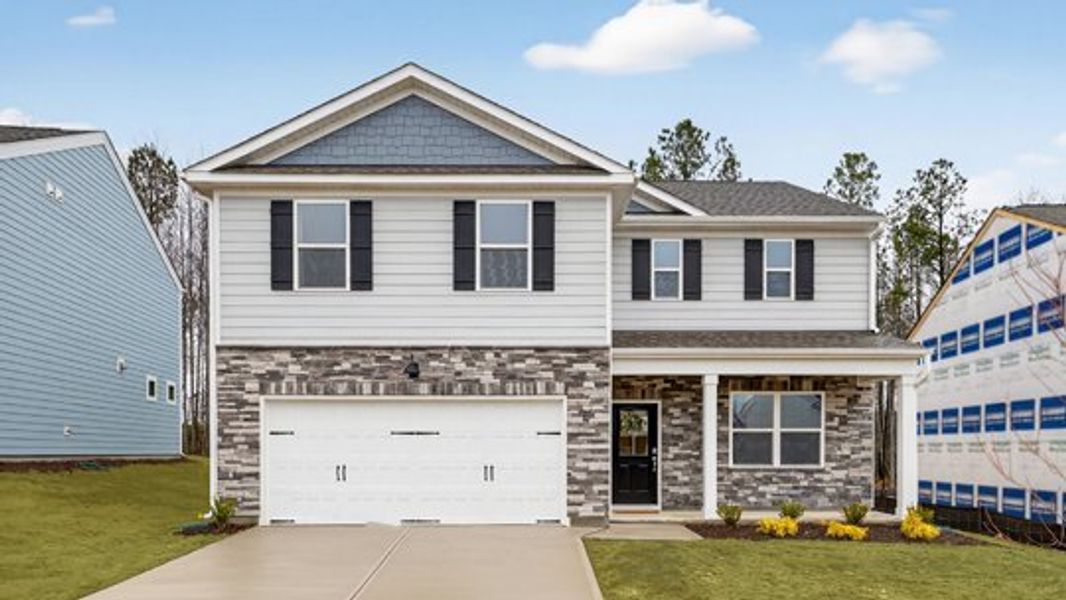 Front exterior of a home in the Bexford community, located in Willow Spring, NC (Image 3).