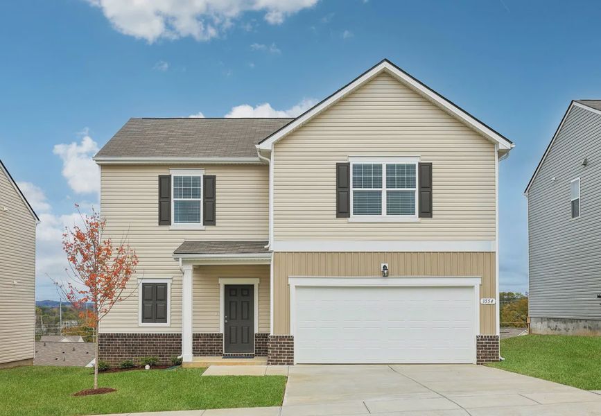 Front exterior of a home in the The Summit at Carters Station community, located in Columbia, TN (Image 3).