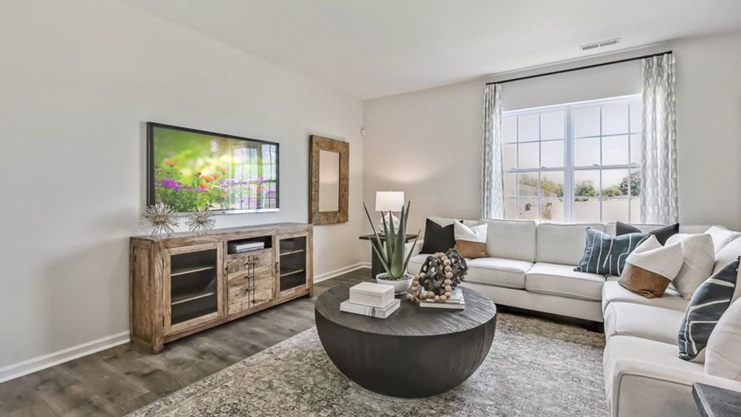 Furnished interior in a model home at The Reserve at Prestleigh in Wake Forest (Image 35).