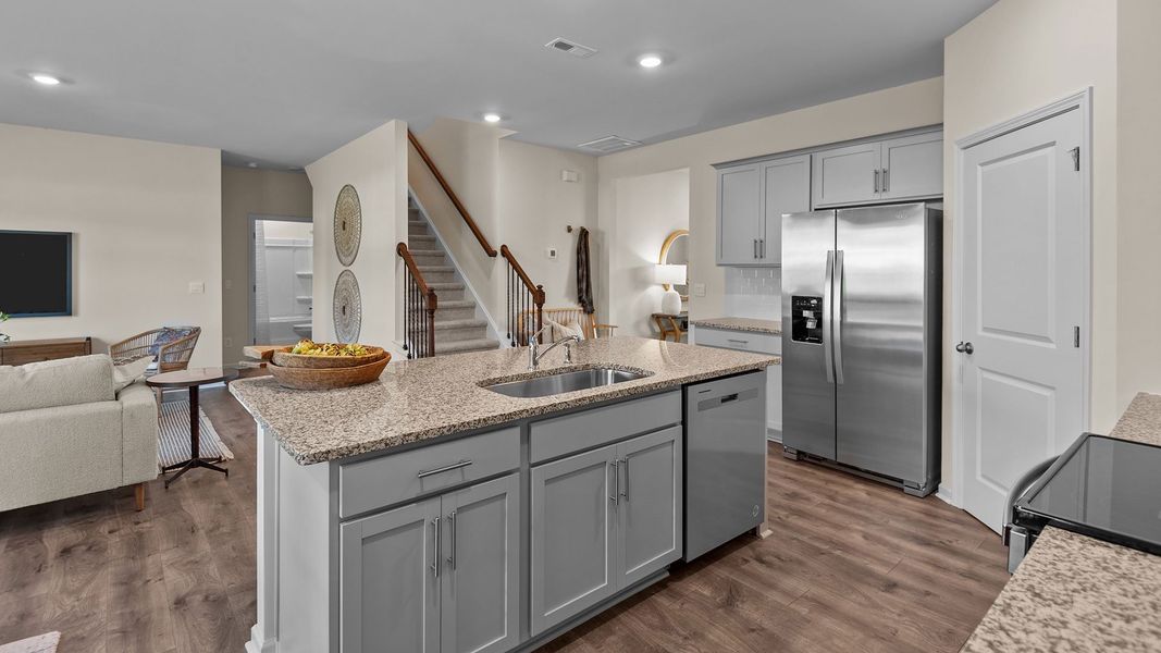 Furnished interior in a model home at The Preserve at Kinsley in Jamestown (Image 7).