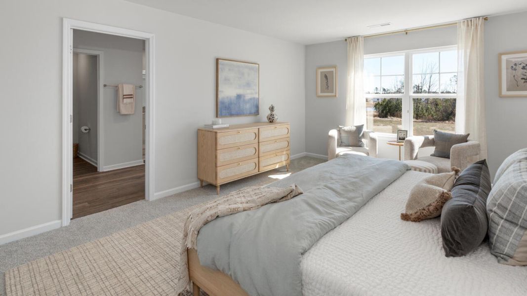 Furnished interior in a model home at The Grove at Blake Farm in Wilmington (Image 27). Furnished interior in a model home at The Grove at Blake Farm in Wilmington (Image 27).