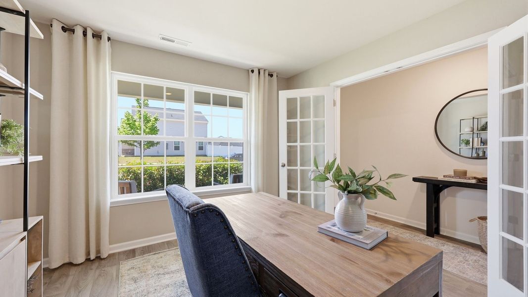 Furnished interior in a model home at Carter Ridge in Greenville (Image 8).