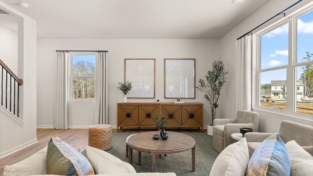 Furnished interior in a model home at South Wind in Fairburn (Image 15).