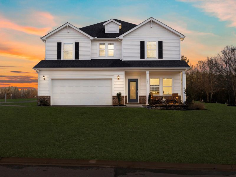 Front exterior of a home in the The Farm at Wells Creek - Signature Collection community, located in Gray Court, SC (Image 1). Front exterior of a home in the The Farm at Wells Creek - Signature Collection community, located in Gray Court, SC (Image 1).