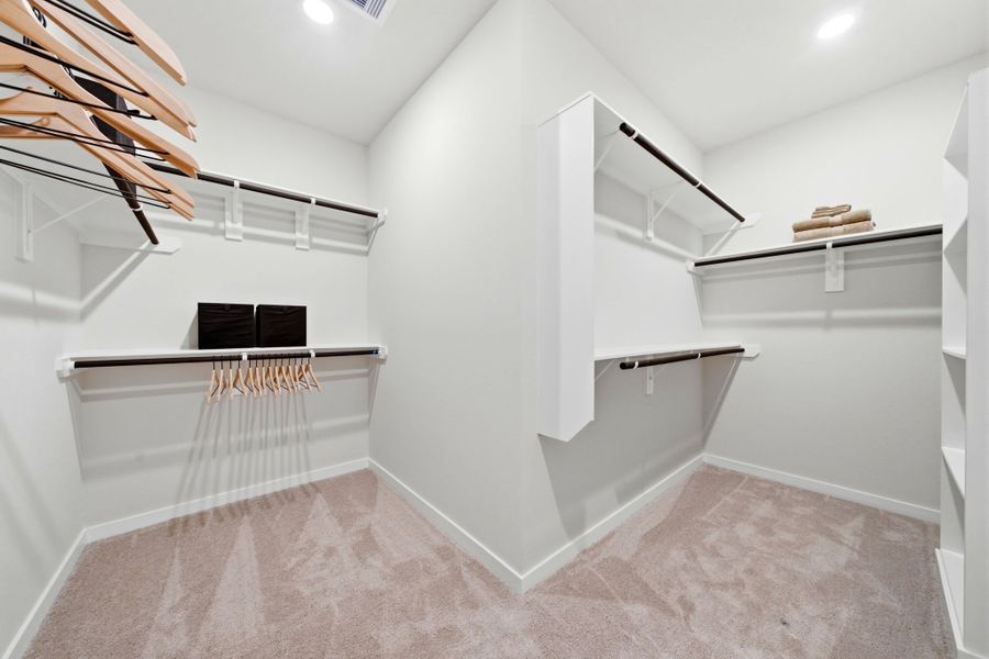 A white bathroom with a white shower. A white bathroom with a white shower.