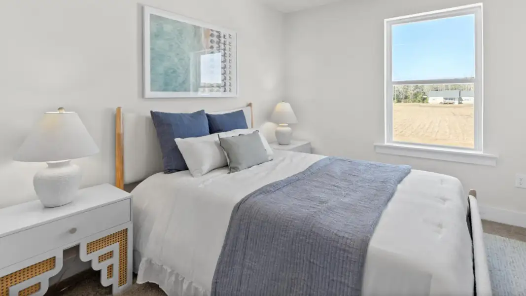 Furnished interior in a model home at The Townes at Cedar Hill Landing in Navassa (Image 27).
