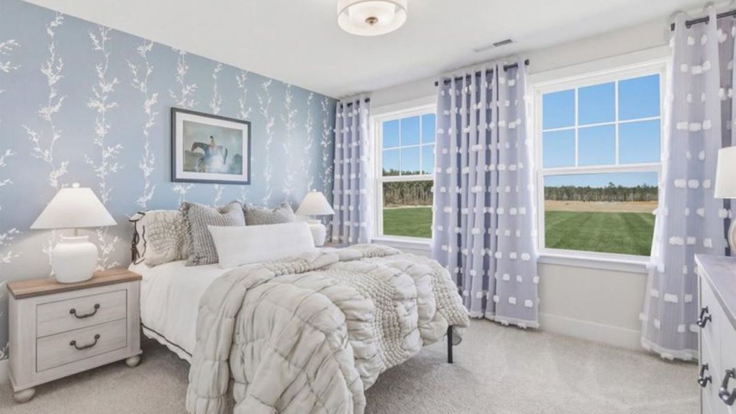 Furnished interior in a model home at Reserve at Crowthorne in Zebulon (Image 25). Furnished interior in a model home at Reserve at Crowthorne in Zebulon (Image 25).