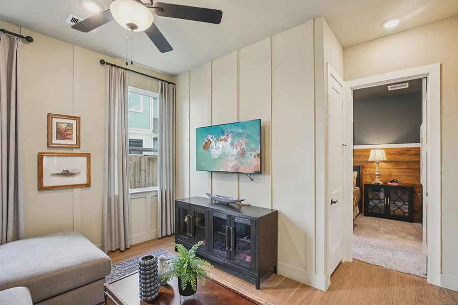 Furnished interior in a model home at Meridiana 50's in Manvel (Image 16).