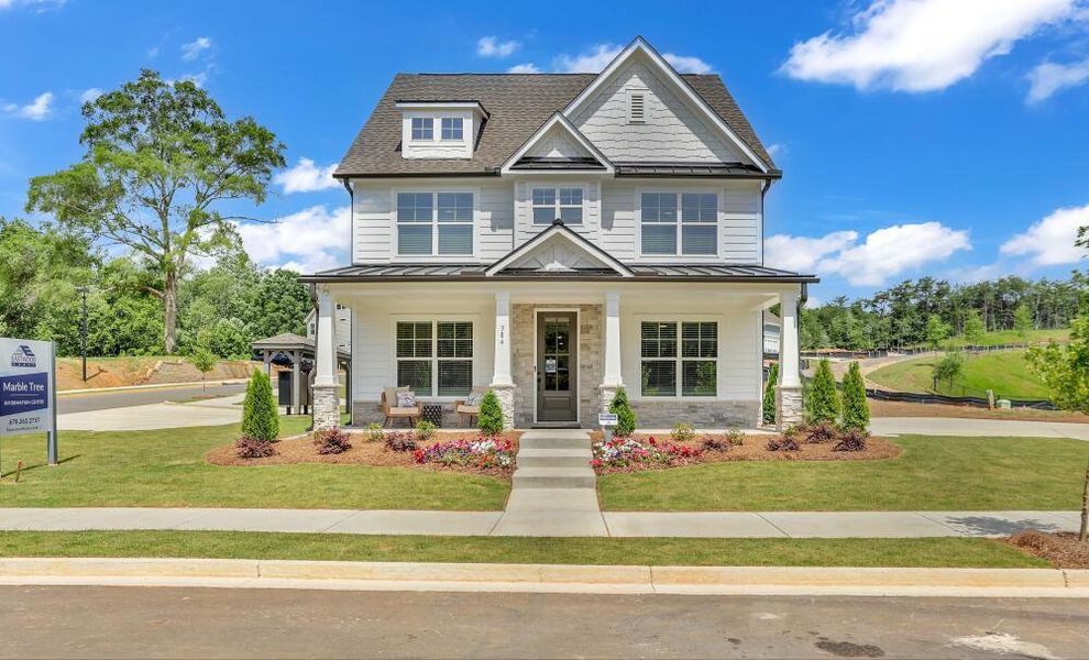 Front exterior of a home in the Marble Tree community, located in Ball Ground, GA (Image 4).