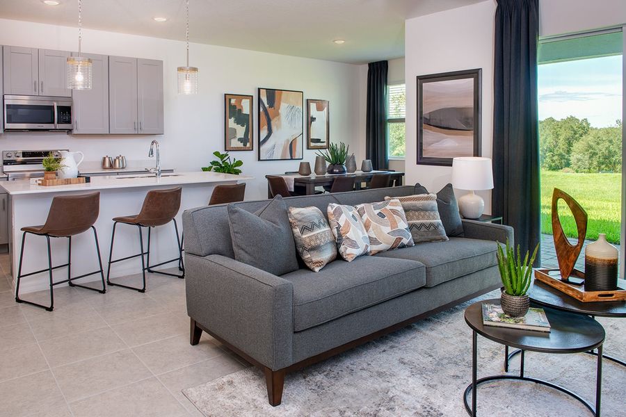 Furnished interior in a model home at Leela Reserve in Tavares (Image 27).