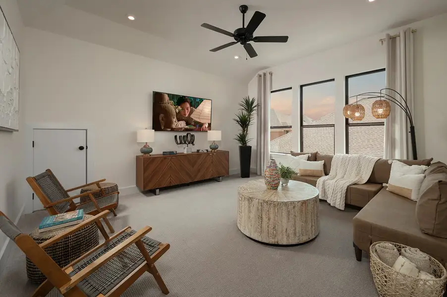 Furnished interior in a model home at 6 Creeks in Kyle (Image 23).