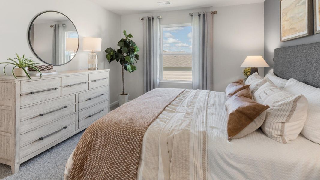 Furnished interior in a model home at Grayson Park Townhomes in Leland (Image 33).