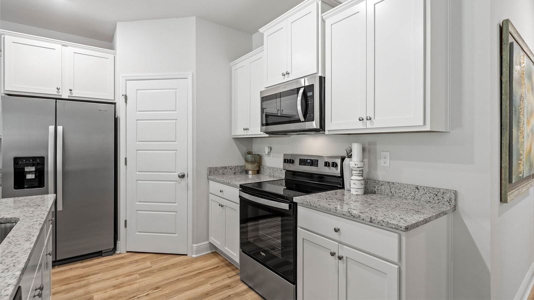 Furnished interior in a model home at Pine Dove Estates in Tallahassee (Image 16).