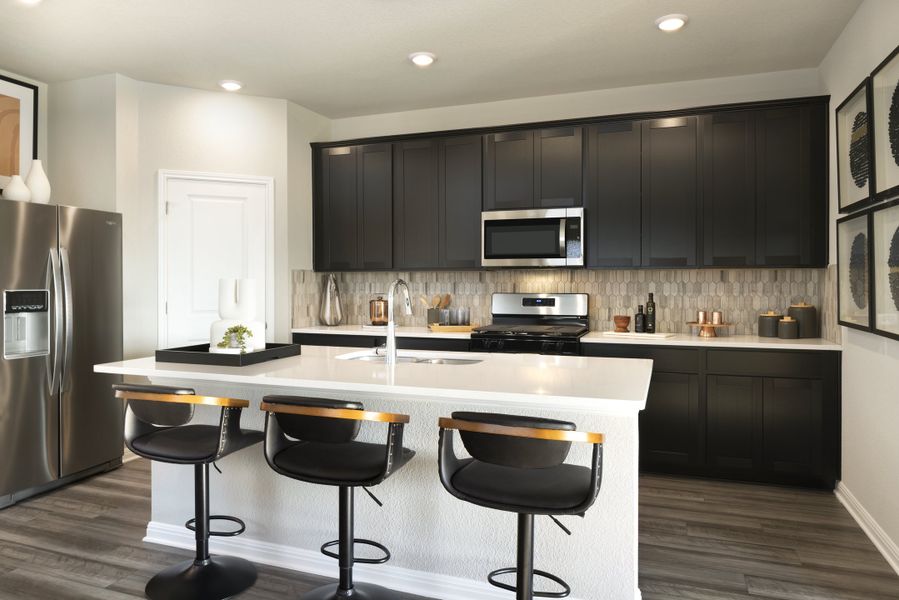 Furnished interior in a model home at Waterstone Crossing in Kyle (Image 25).