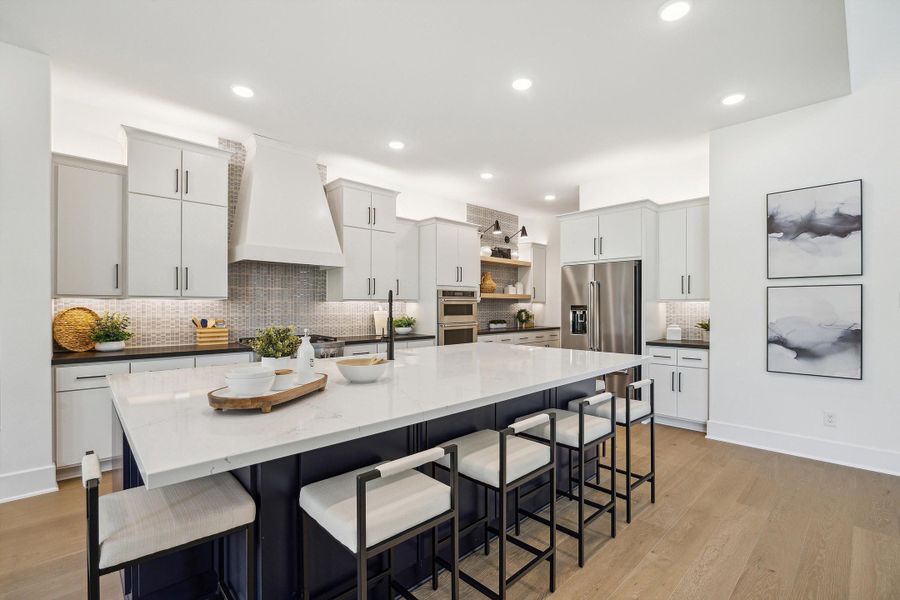 Furnished interior in a model home at Audubon - 70' in Magnolia (Image 6).