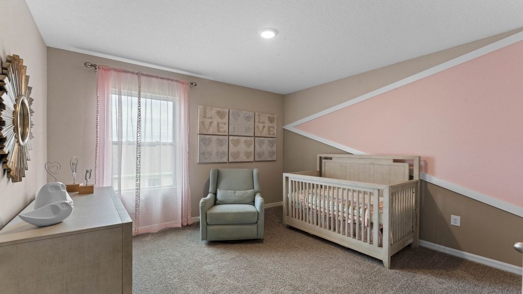 Furnished interior in a model home at Gardenside at Ormond Station in Ormond Beach (Image 11).
