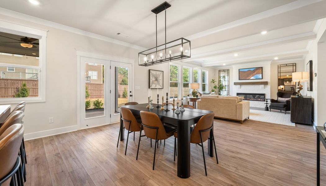 Furnished interior in a model home at Pinecrest Ridge in Dacula (Image 7).