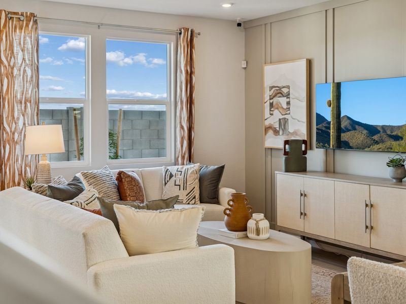 A living room with a large window.