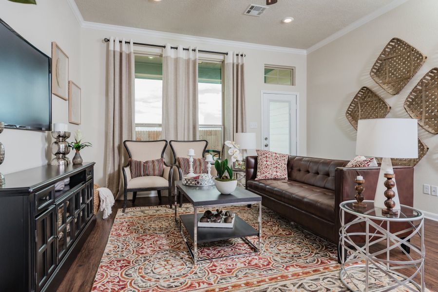Furnished interior in a model home at Vintage Farms in Brenham (Image 4).