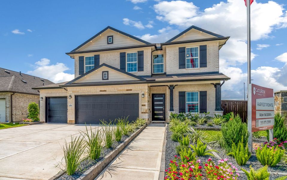 Front exterior of a home in the Harvest Pointe community, located in Needville, TX (Image 2).