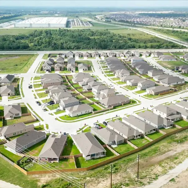 Aerial view of the Olympia Falls community in Fresno, TX, showing layout and nearby surroundings (Image 1).