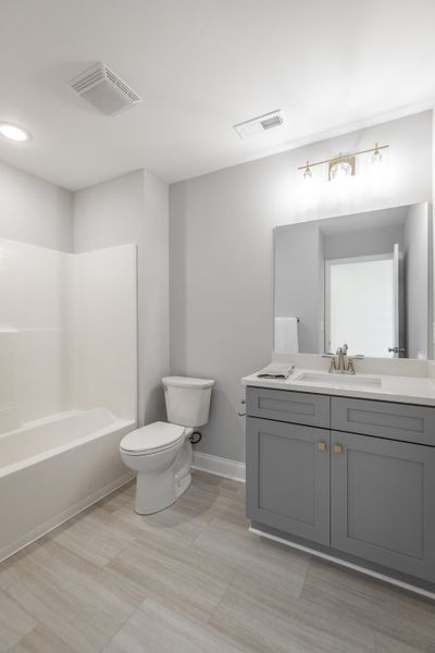 Furnished interior in a model home at The Exuma in Ooltewah (Image 31).