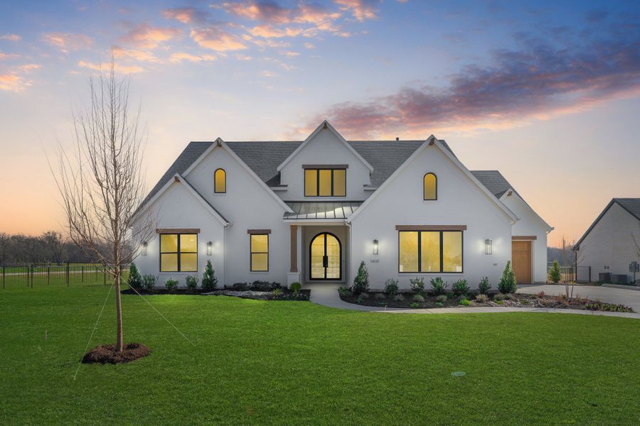 Front exterior of a home in the Enchanted Creek community, located in Lucas, TX (Image 10).