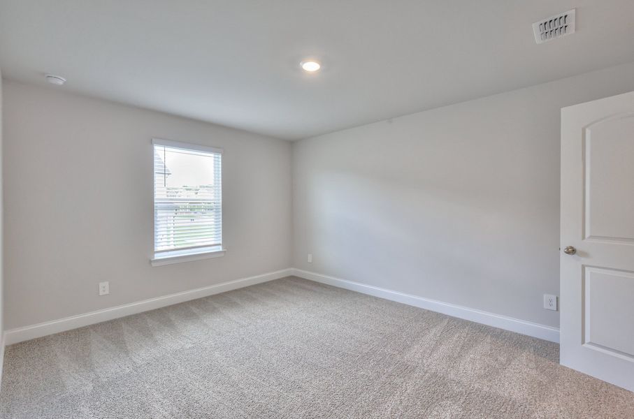 The primary suite offers a private retreat.