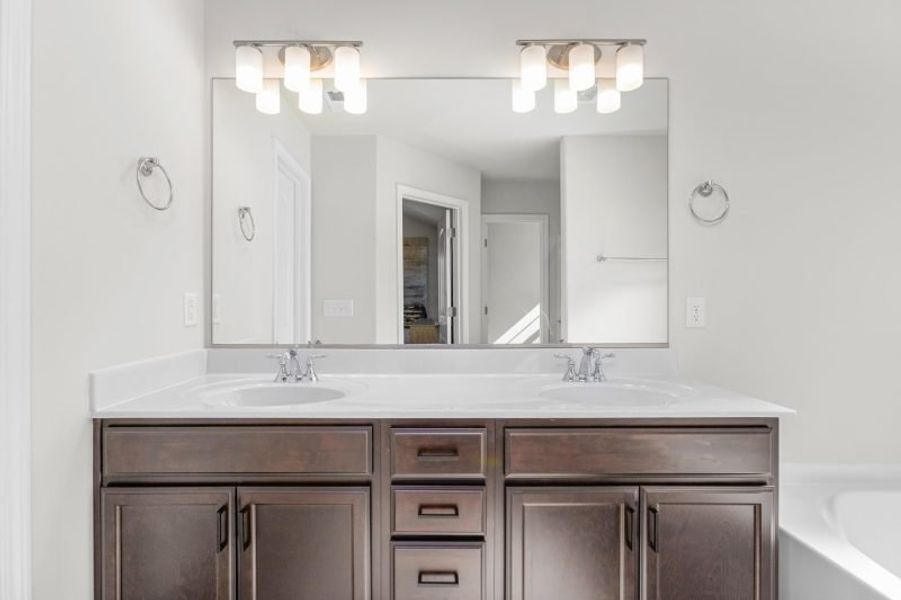 Furnished interior in a model home at The Wilcox in Greensboro (Image 57).