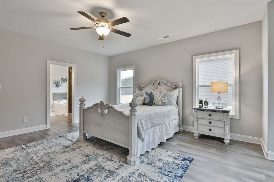Furnished interior in a model home at Estates at Dorsett Bridge in Douglasville (Image 15).