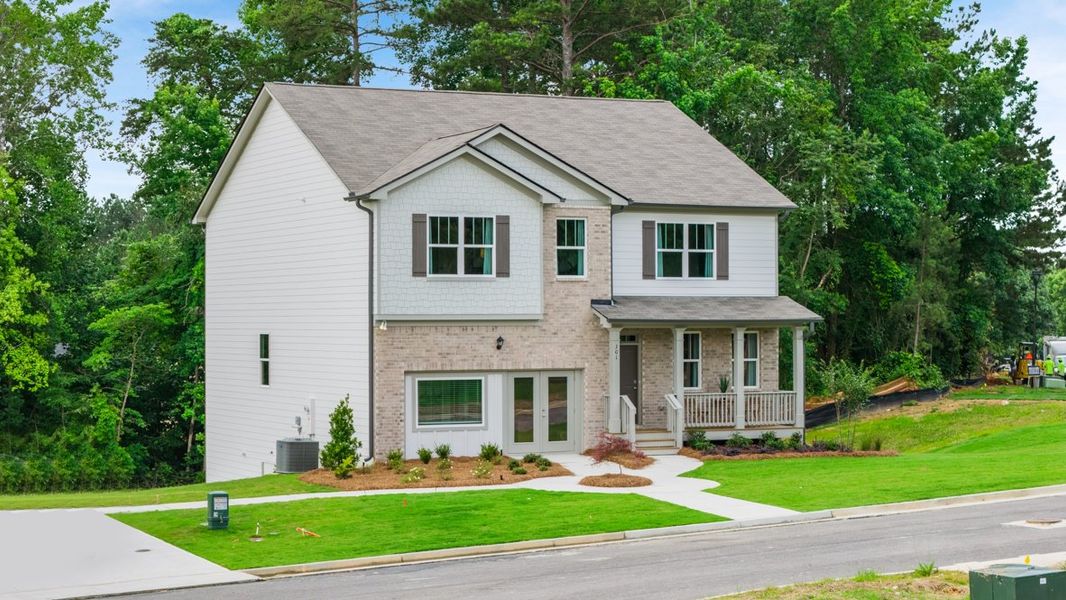 Front exterior of a home in the Northwoods at Mirror Lake community, located in Villa Rica, GA (Image 4).