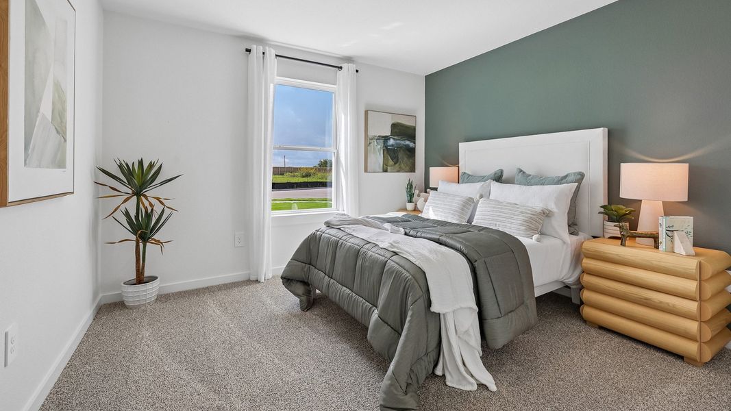 Furnished interior in a model home at Monarch Ranch in Manor (Image 34).