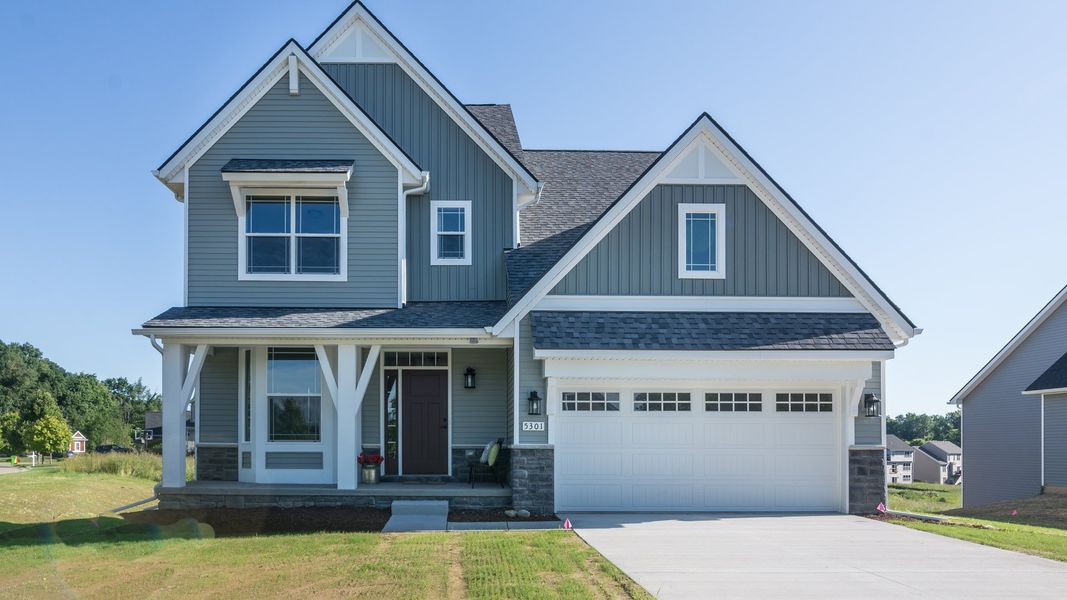 Front exterior of a home in the Mystic Ridge community, located in Whitmore Lake, MI (Image 8). Front exterior of a home in the Mystic Ridge community, located in Whitmore Lake, MI (Image 8).