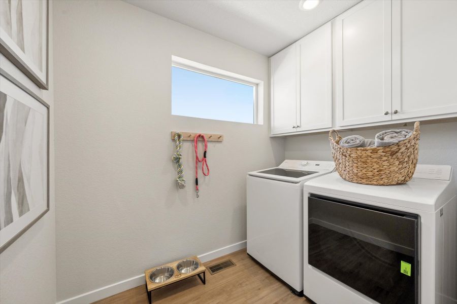 A kitchen with white cabinets. A kitchen with white cabinets.