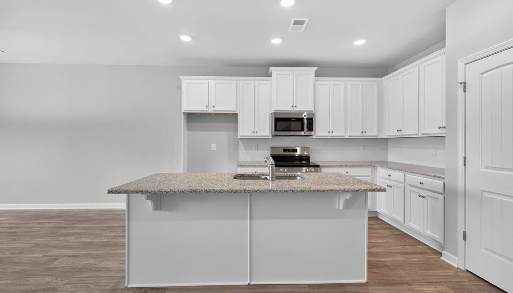 Furnished interior in a model home at The Reserve at Clocktower in Douglasville (Image 26).