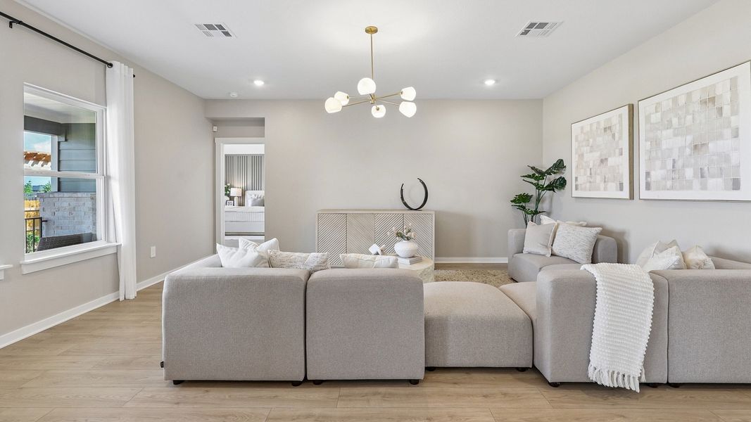 Furnished interior in a model home at Monarch Ranch in Manor (Image 25).