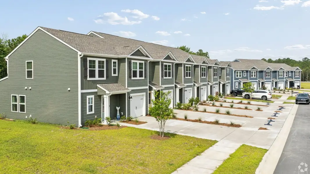Front exterior of a home in the The Willows at Blake Farm EXP community, located in Wilmington, NC (Image 5). Front exterior of a home in the The Willows at Blake Farm EXP community, located in Wilmington, NC (Image 5).