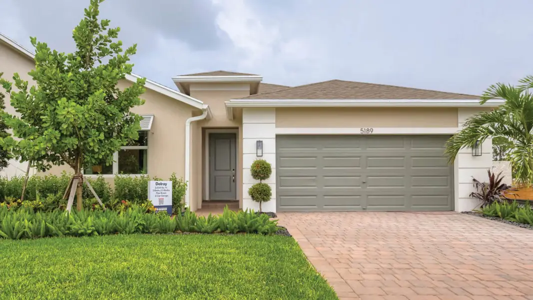 Front exterior of a home in the Blossom Trail community, located in Greenacres, FL (Image 1). Front exterior of a home in the Blossom Trail community, located in Greenacres, FL (Image 1).